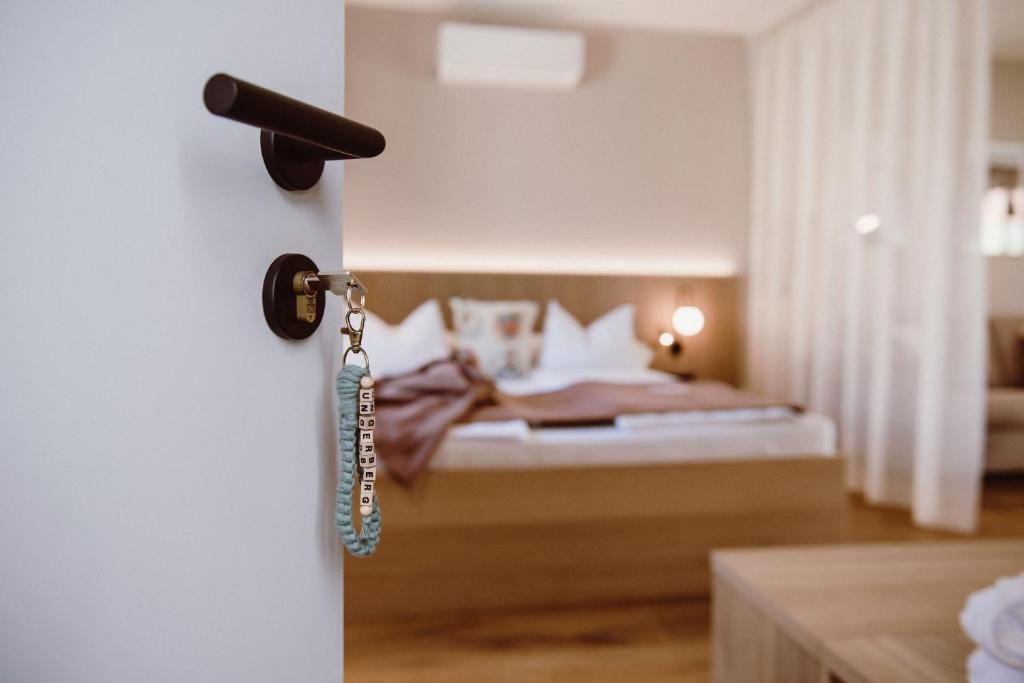 Postel nebo postele na pokoji v ubytování Achs-Wendelin Weinlofts