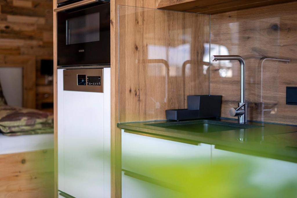 Kuchyň nebo kuchyňský kout v ubytování Apartment LENA