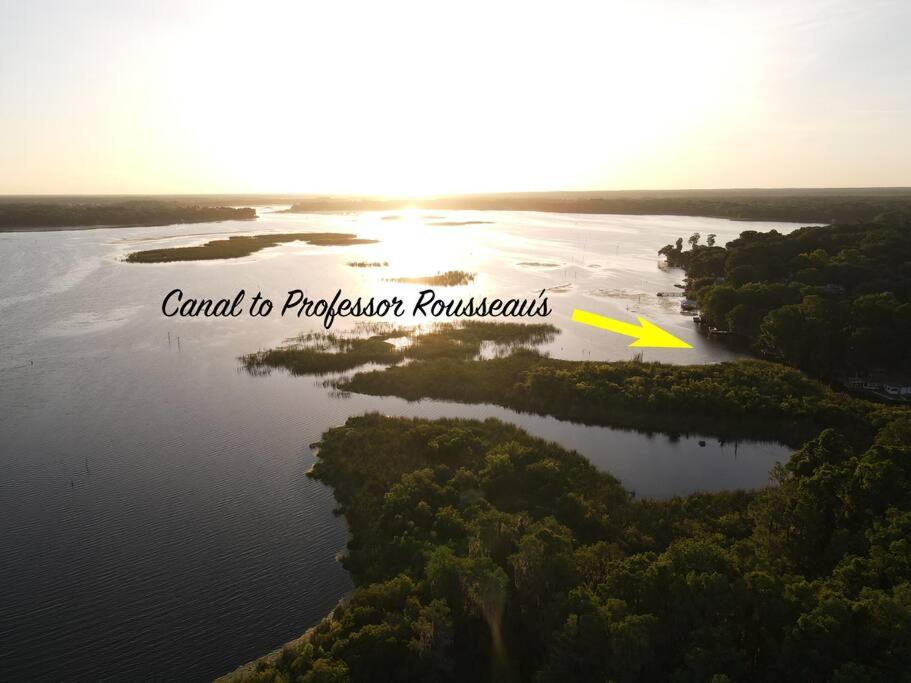 an aerial view of a river with a yellow arrow at Professor Rousseau's Manatee Bay in Crystal River