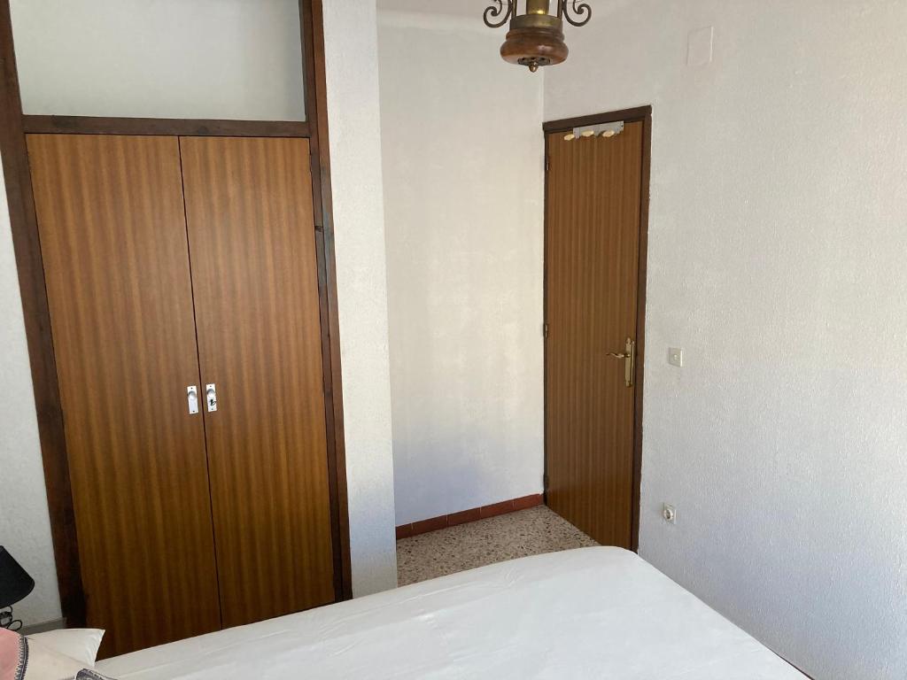Posteľ alebo postele v izbe v ubytovaní Apartamento L'Estartit