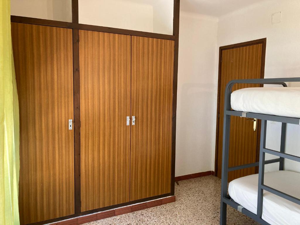 Posteľ alebo postele v izbe v ubytovaní Apartamento L'Estartit
