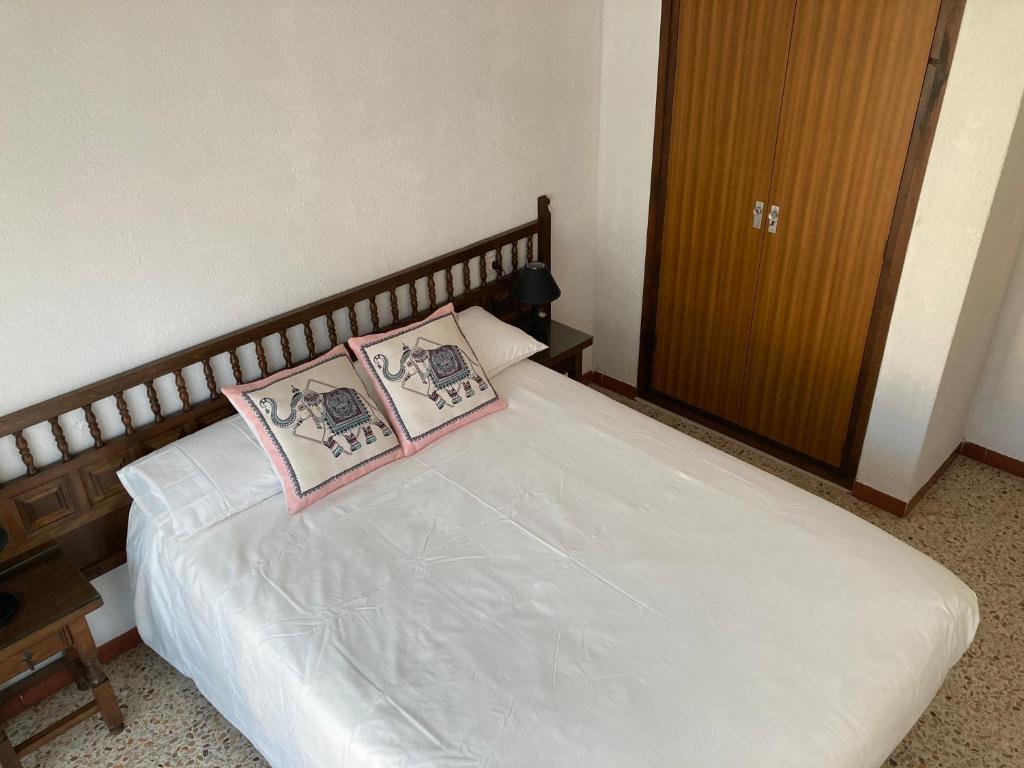 Posteľ alebo postele v izbe v ubytovaní Apartamento L'Estartit