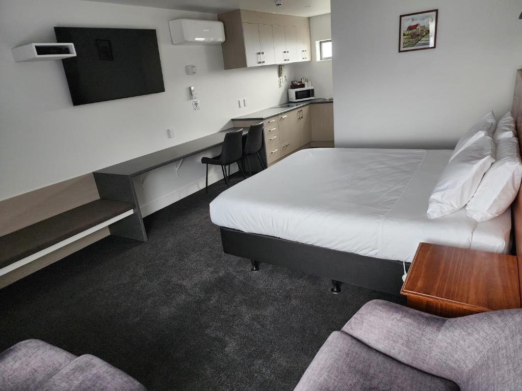 Kuchyň nebo kuchyňský kout v ubytování Auto Lodge Motel