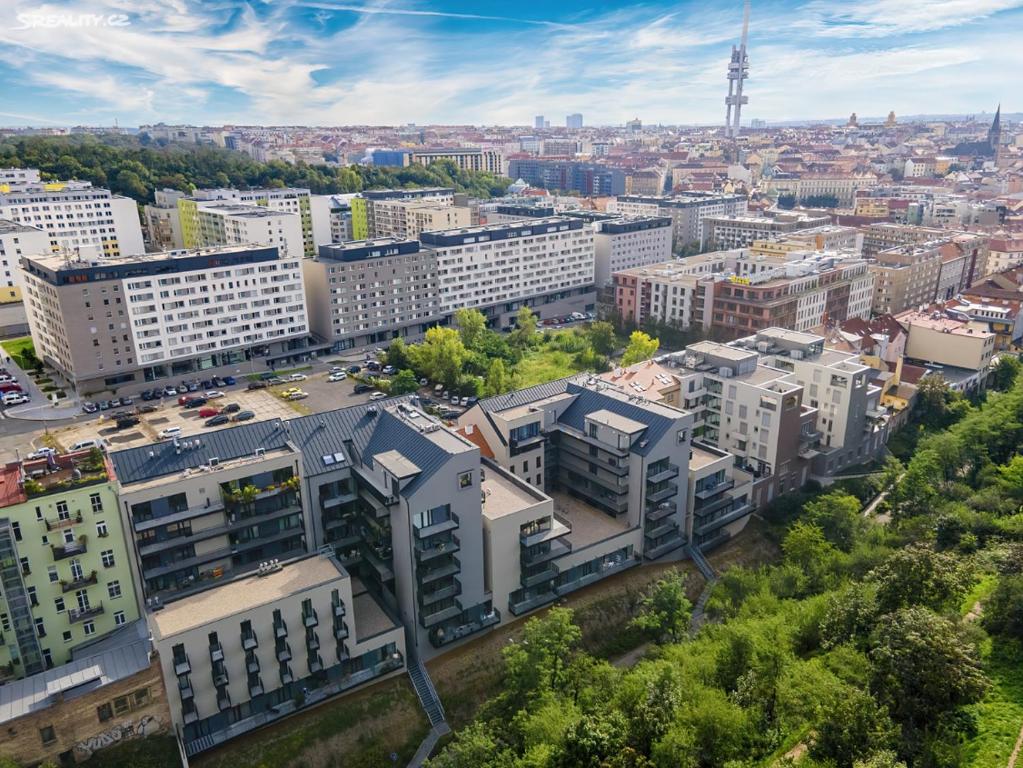 an aerial view of a city with tall buildings at Central Prague Vítkov - free parking in Prague