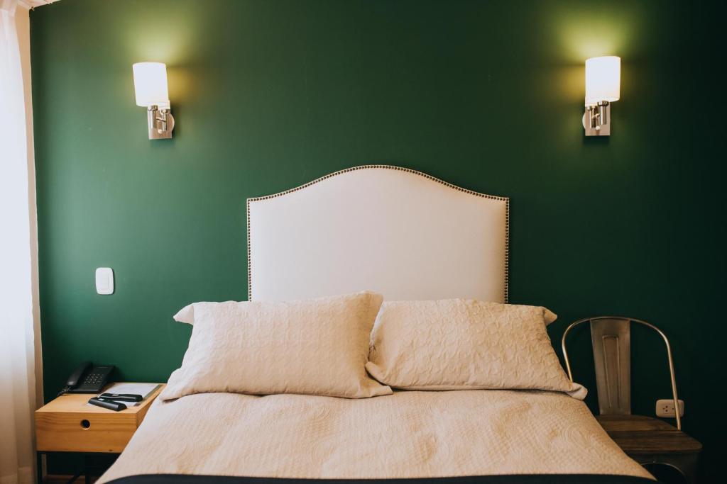 Postel nebo postele na pokoji v ubytování Anden Inca Hotel