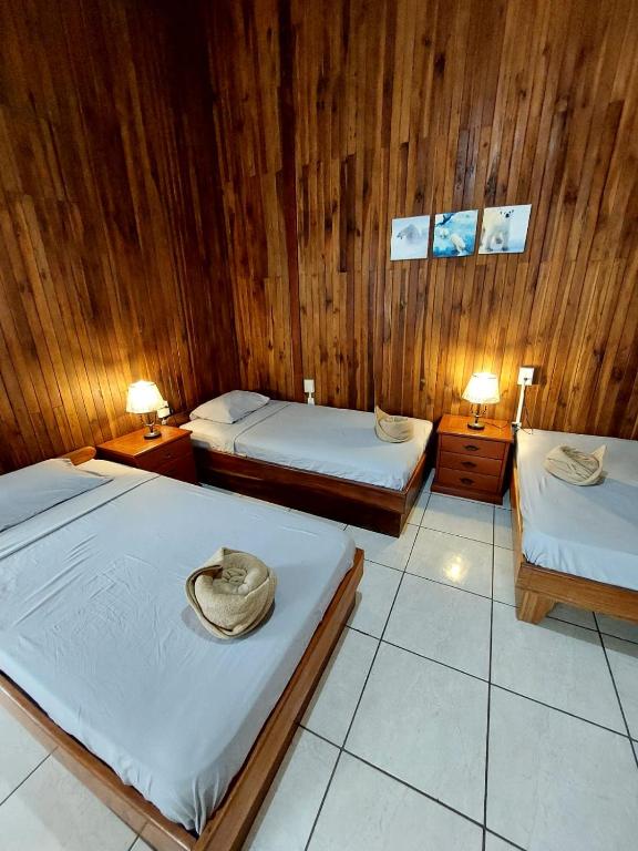 Postel nebo postele na pokoji v ubytování Hotel Aurora