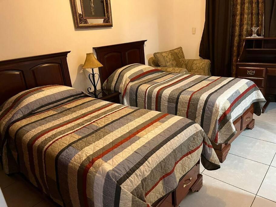 Ένα ή περισσότερα κρεβάτια σε δωμάτιο στο Casa Villa Serena