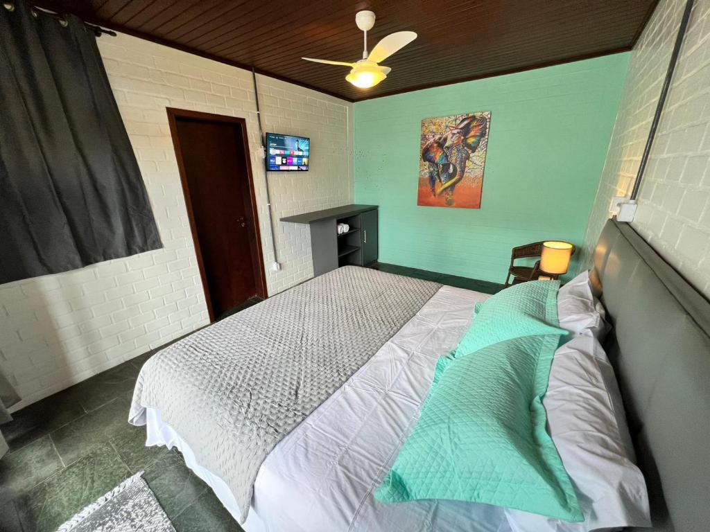 Postel nebo postele na pokoji v ubytování Pousada Trilha da Serra