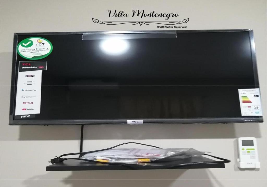 TV a/nebo společenská místnost v ubytování Habitación privada en Salinas