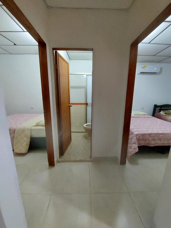 Postel nebo postele na pokoji v ubytování Guio Apartamentos