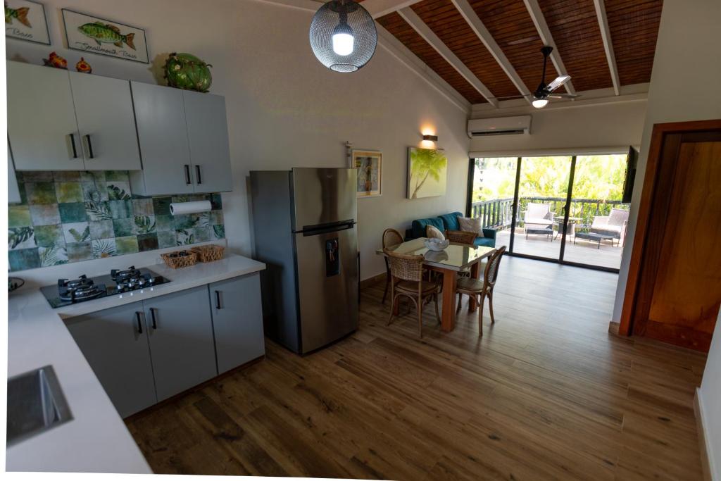 Kuchyň nebo kuchyňský kout v ubytování Beach Apartment Villas Jubey, Emotion access