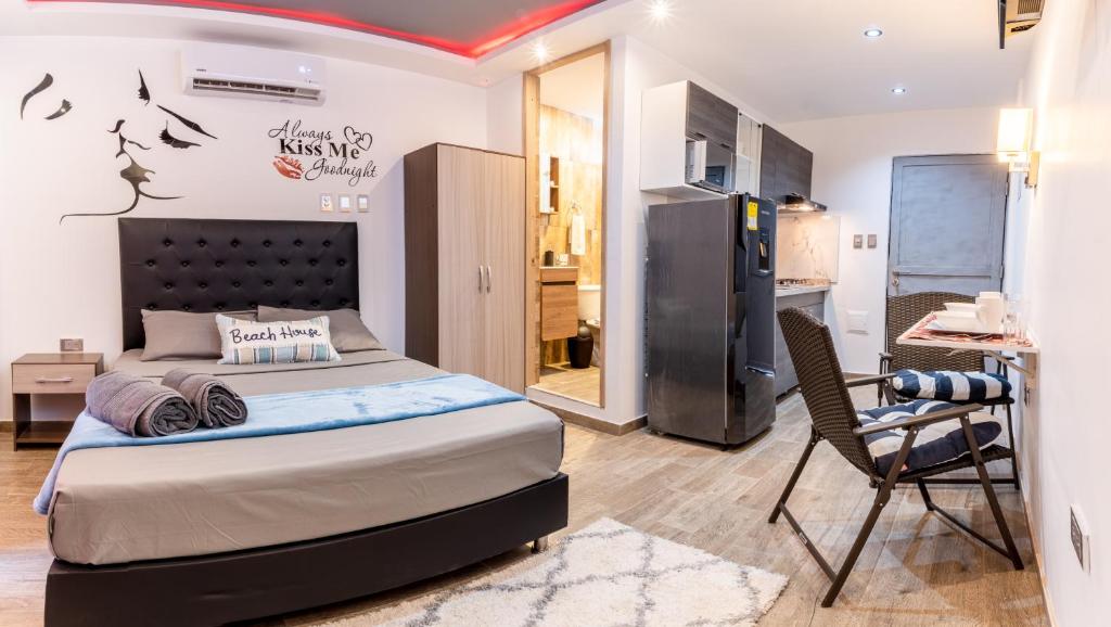 Katil atau katil-katil dalam bilik di Confort+Relax= Romántico ApartaEstudio + Piscina + Parqueadero