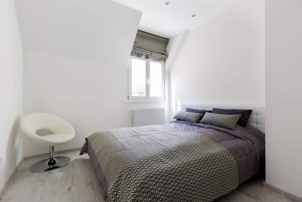 Postel nebo postele na pokoji v ubytování Budapest Central Square 2 bedrooms Suite - Michaelides Residences