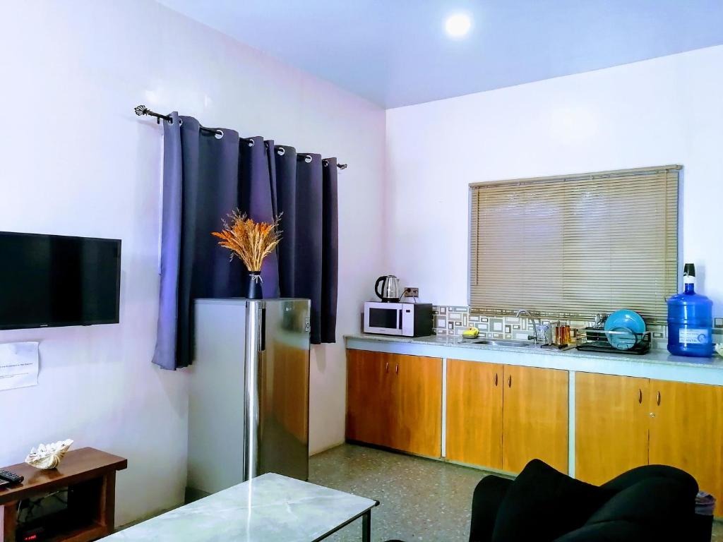 Kuchyň nebo kuchyňský kout v ubytování Marino Bungalows