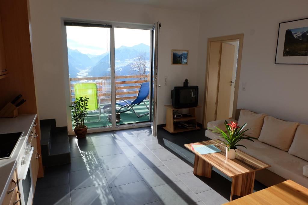 Nespecifikovaný výhled na hory nebo výhled na hory při pohledu z apartmánu