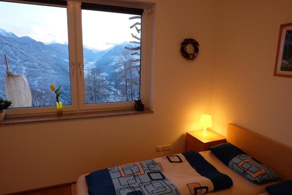 Nespecifikovaný výhled na hory nebo výhled na hory při pohledu z apartmánu