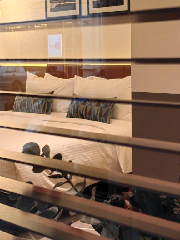 Postel nebo postele na pokoji v ubytování Citadines Connect Georgetown Penang