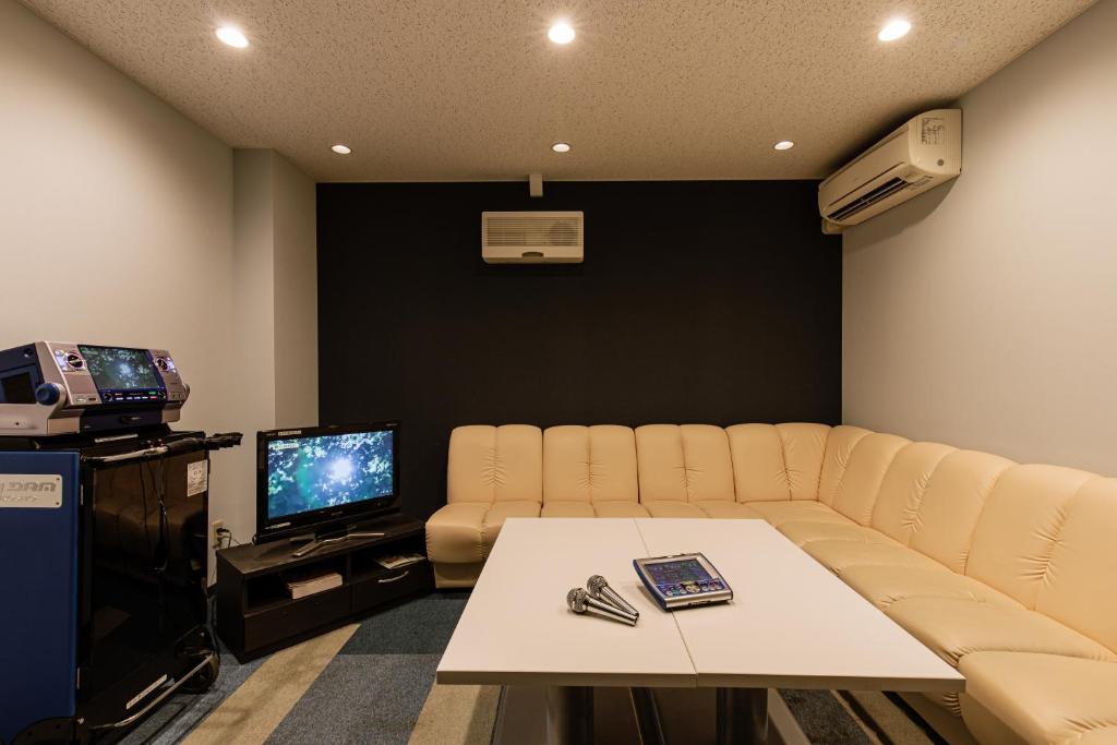 TV a/nebo společenská místnost v ubytování KAMENOI HOTEL Chitamihama