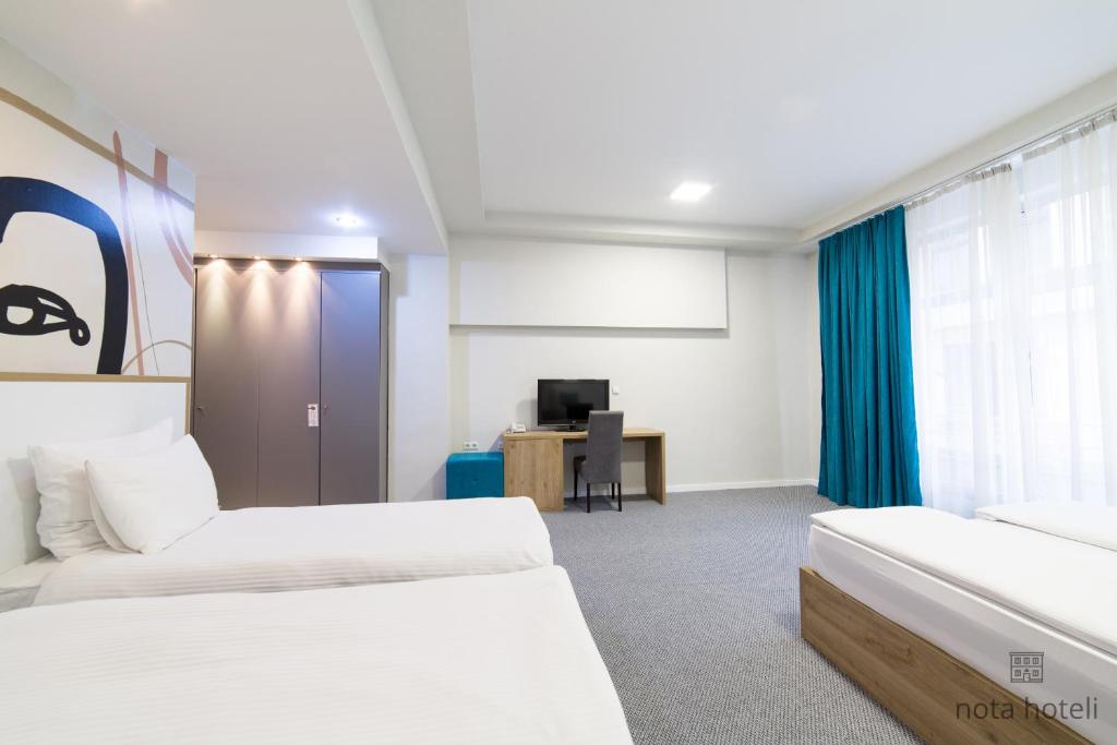 Krevet ili kreveti u jedinici u okviru objekta Hotel Sahat