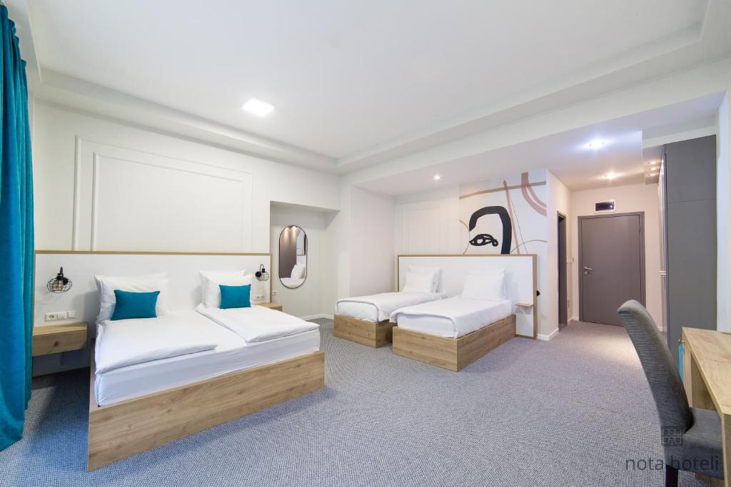 Krevet ili kreveti u jedinici u okviru objekta Hotel Sahat
