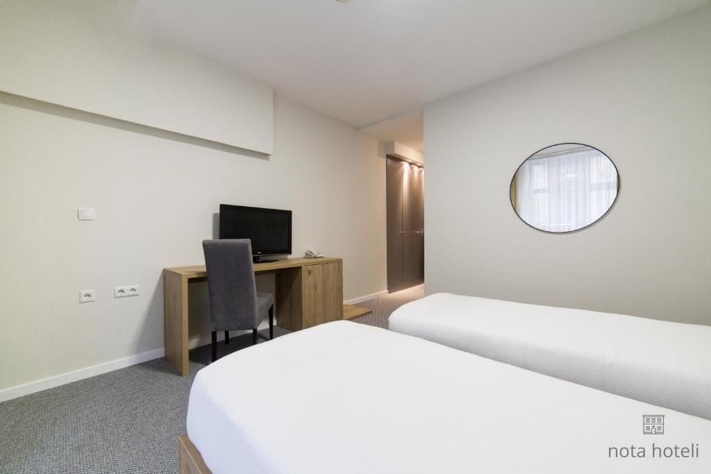 Krevet ili kreveti u jedinici u okviru objekta Hotel Sahat