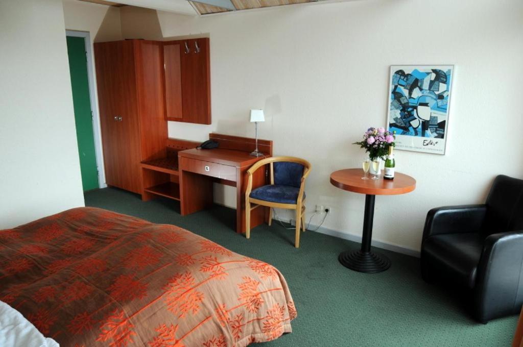 Postel nebo postele na pokoji v ubytování Hotel Hirtshals