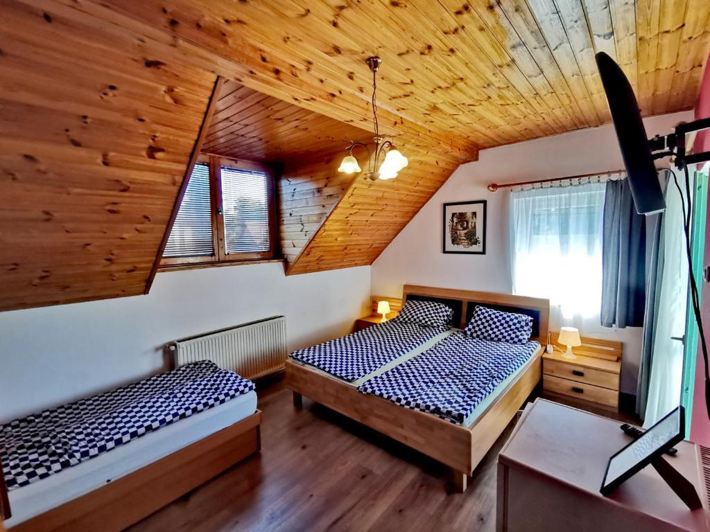 Postel nebo postele na pokoji v ubytování Dolce Villa Balaton