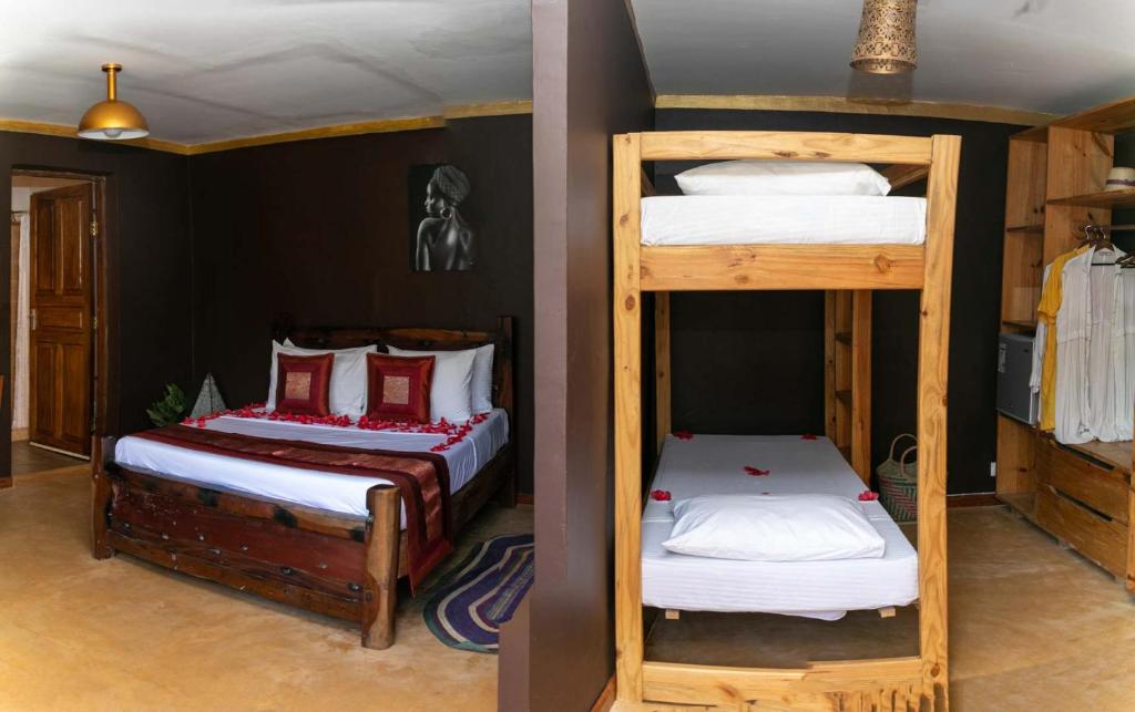 Postel nebo postele na pokoji v ubytování Kibanda Natural Kendwa Villa