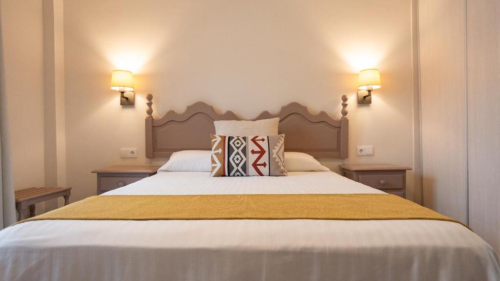 Posteľ alebo postele v izbe v ubytovaní Hotel Casa Palacio la Sal