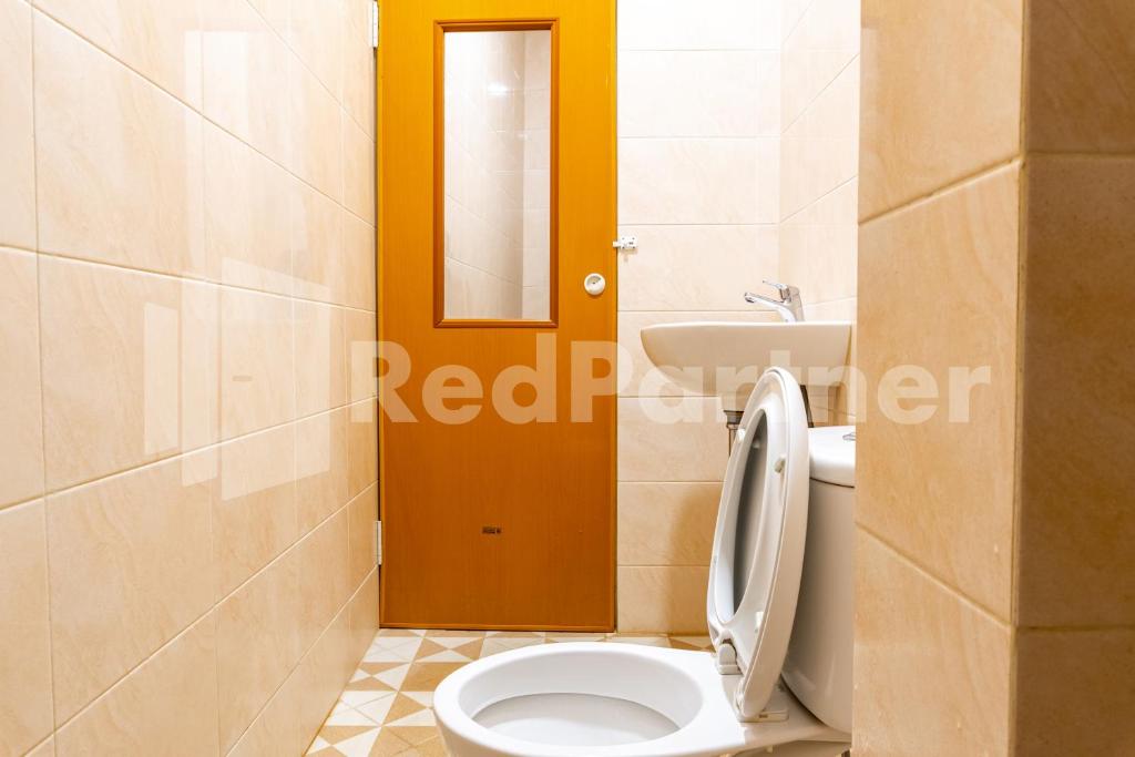 Adam Malik Guesthouse near Regale ICC Medan Mitra RedDoorz - Habitación Doble Deluxe