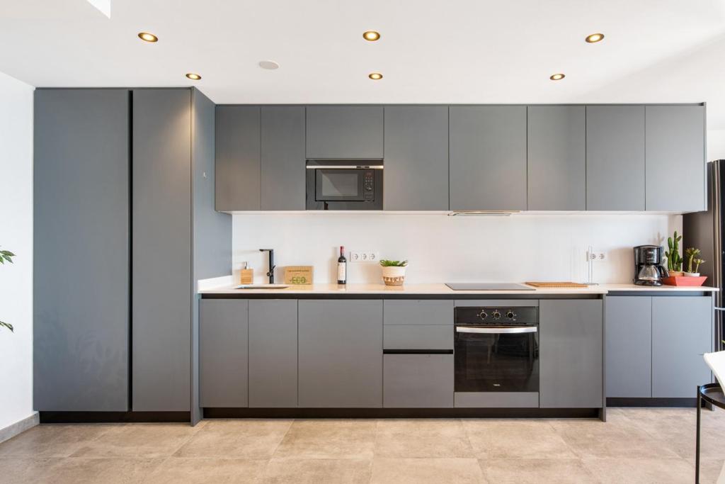 Kuchyňa alebo kuchynka v ubytovaní Apartment Topacio 1 - Plusholidays