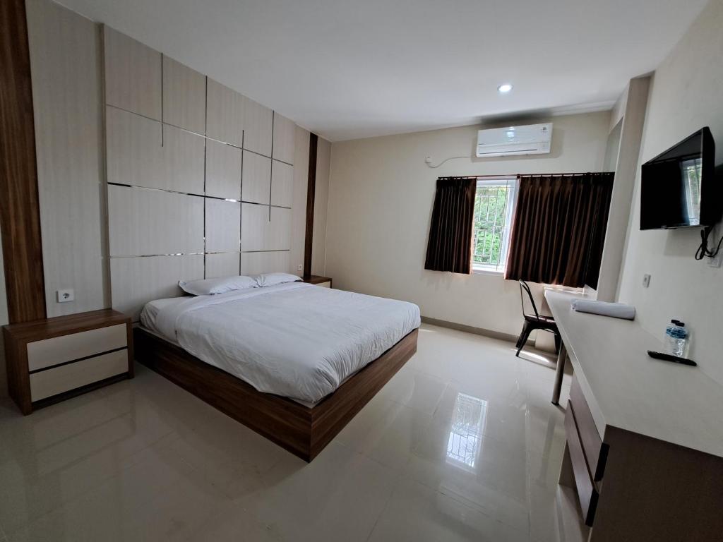 Letto o letti in una camera di Pillow Guest House