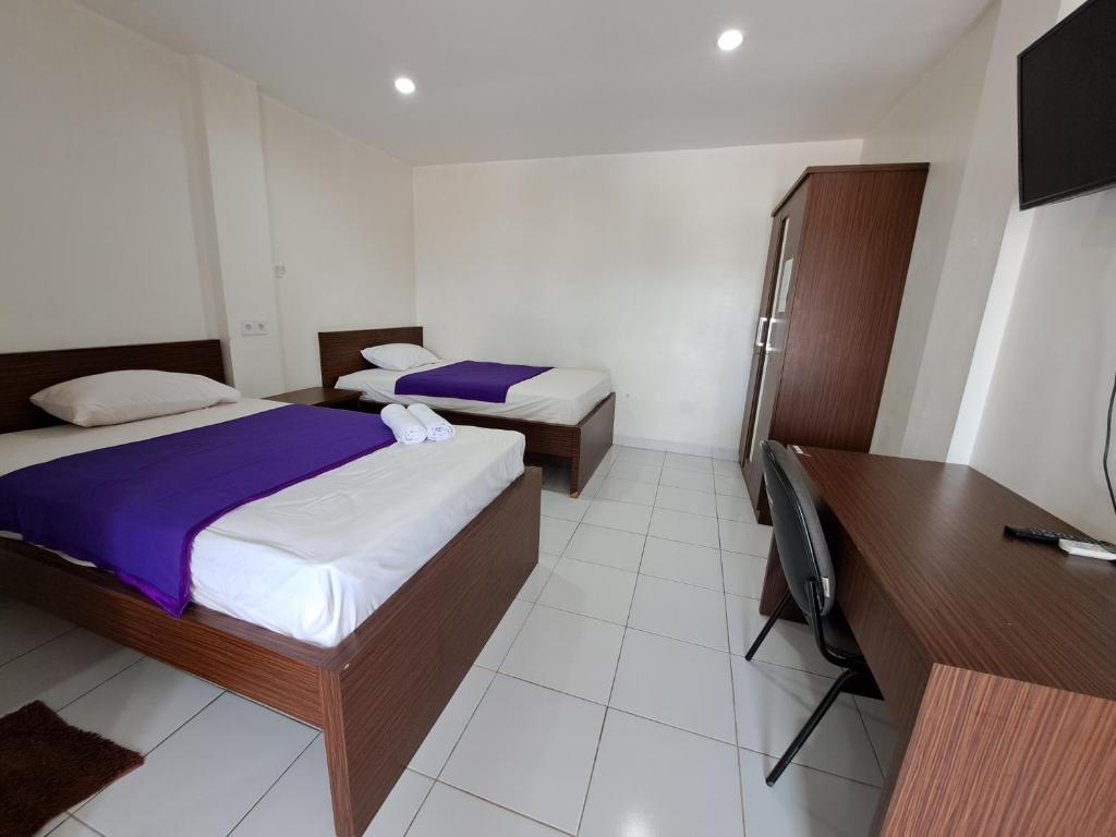 Letto o letti in una camera di Pillow Guest House