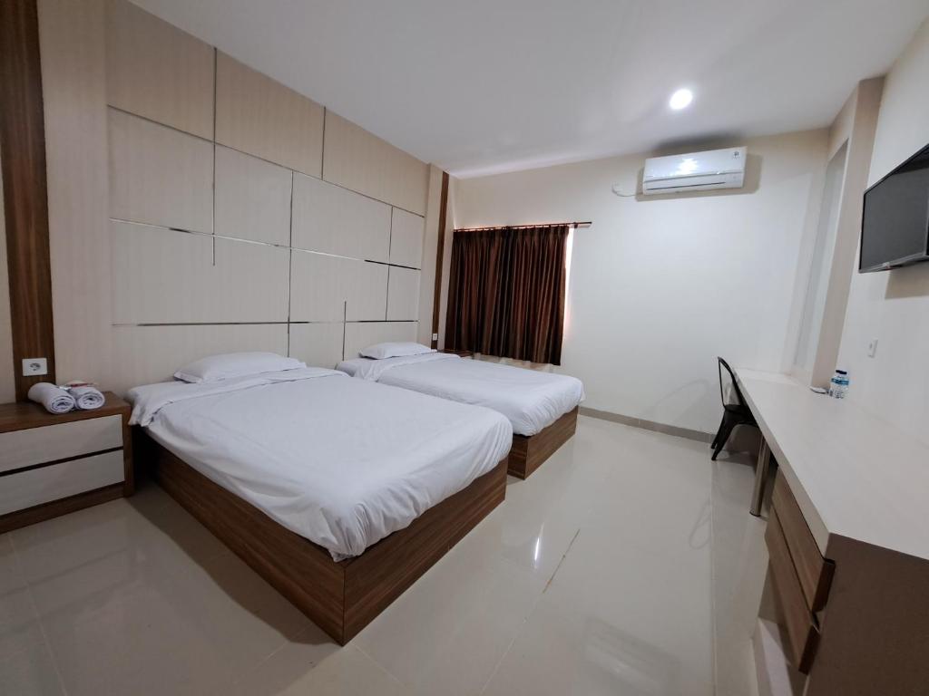 Letto o letti in una camera di Pillow Guest House