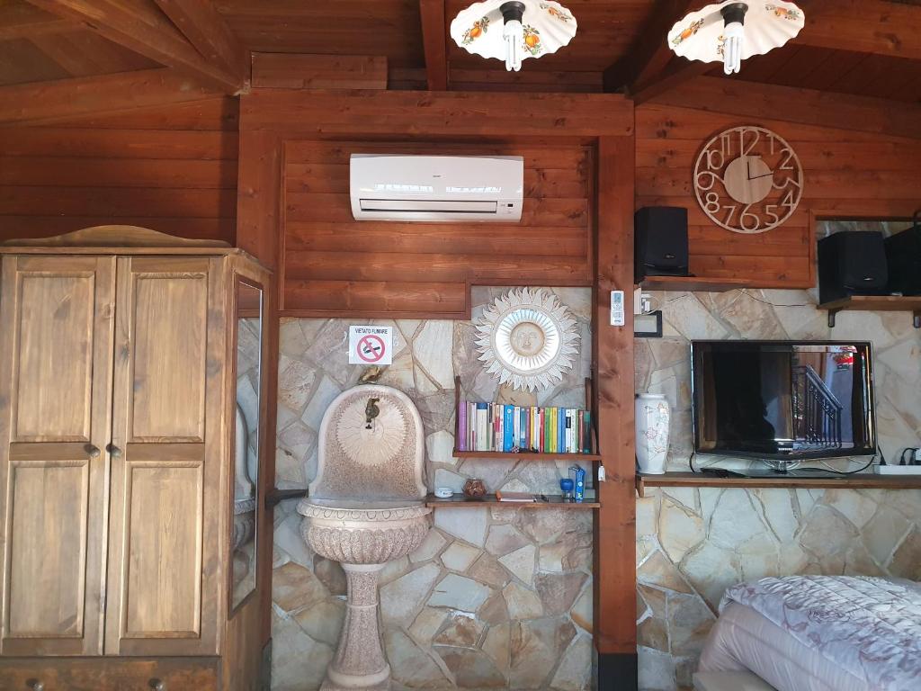 A kitchen or kitchenette at La Dependance delle Mimose
