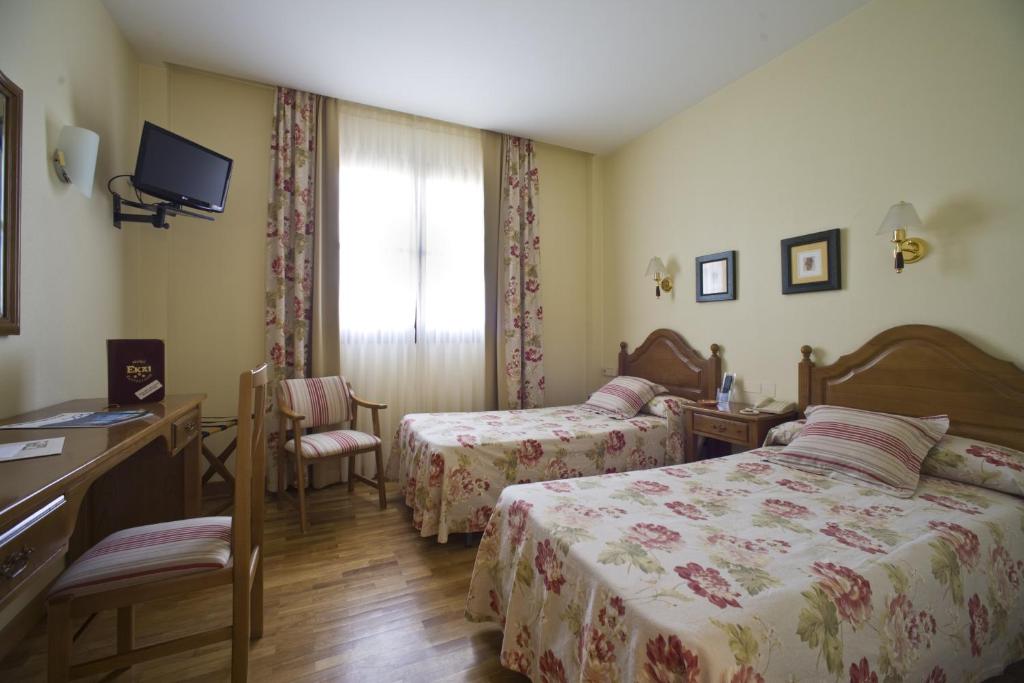 Postel nebo postele na pokoji v ubytování Hotel Ekai