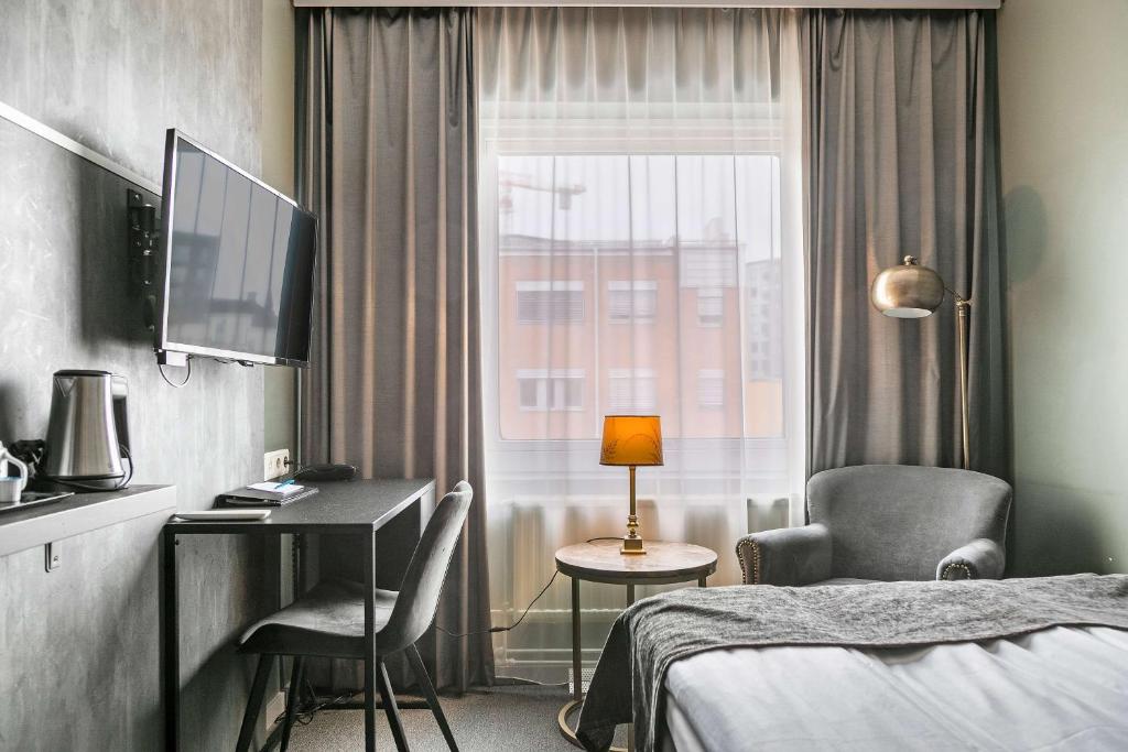 Postel nebo postele na pokoji v ubytování Best Western Ta Inn Hotel