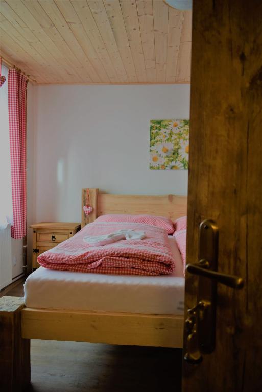Postel nebo postele na pokoji v ubytování Penzion U Lípy