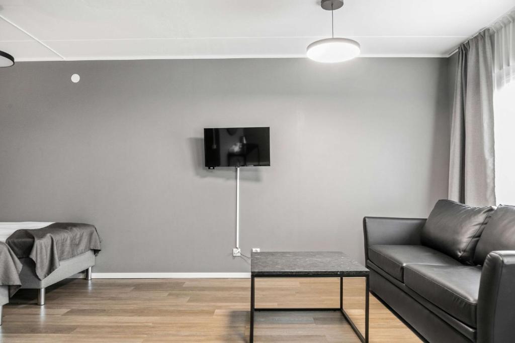TV a/nebo společenská místnost v ubytování Best Western Ta Inn Hotel