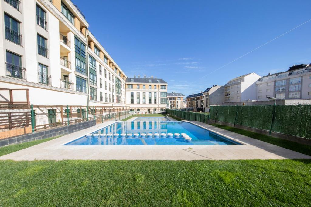 Πισίνα στο ή κοντά στο Apartagal-Urbanización Foz II