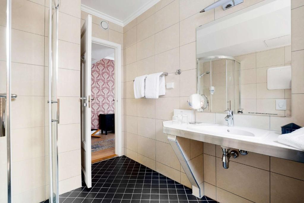 Koupelna v ubytování Best Western Plus Hotel Bakeriet