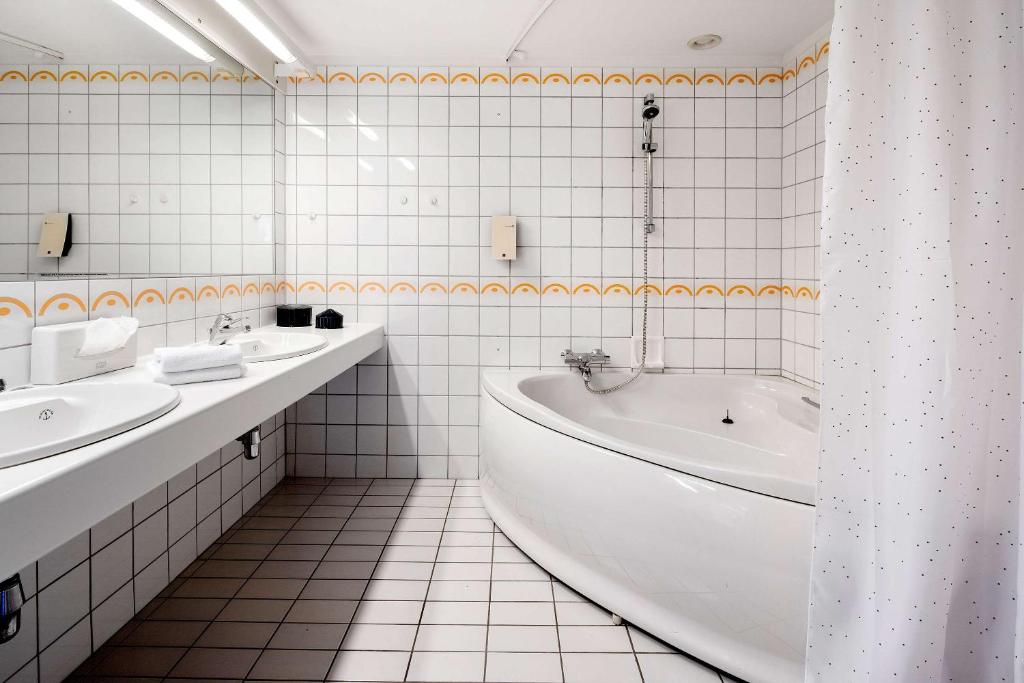 Koupelna v ubytování Best Western Plus Hotel Bakeriet