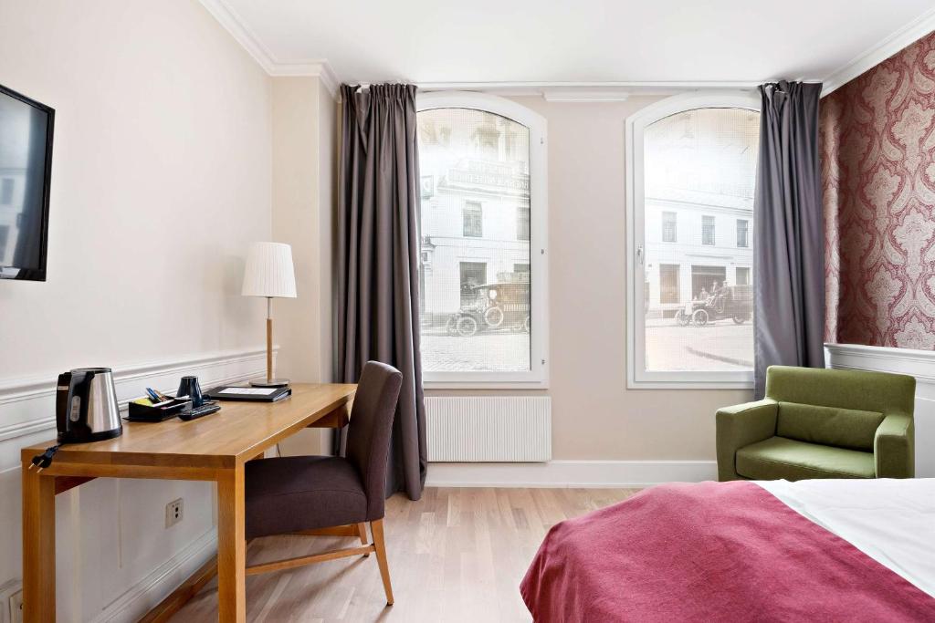 TV a/nebo společenská místnost v ubytování Best Western Plus Hotel Bakeriet
