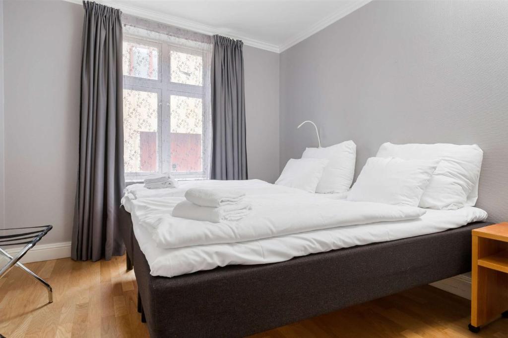 Postel nebo postele na pokoji v ubytování Best Western Plus Hotel Bakeriet