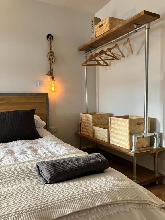 A bed or beds in a room at Fig Tree House