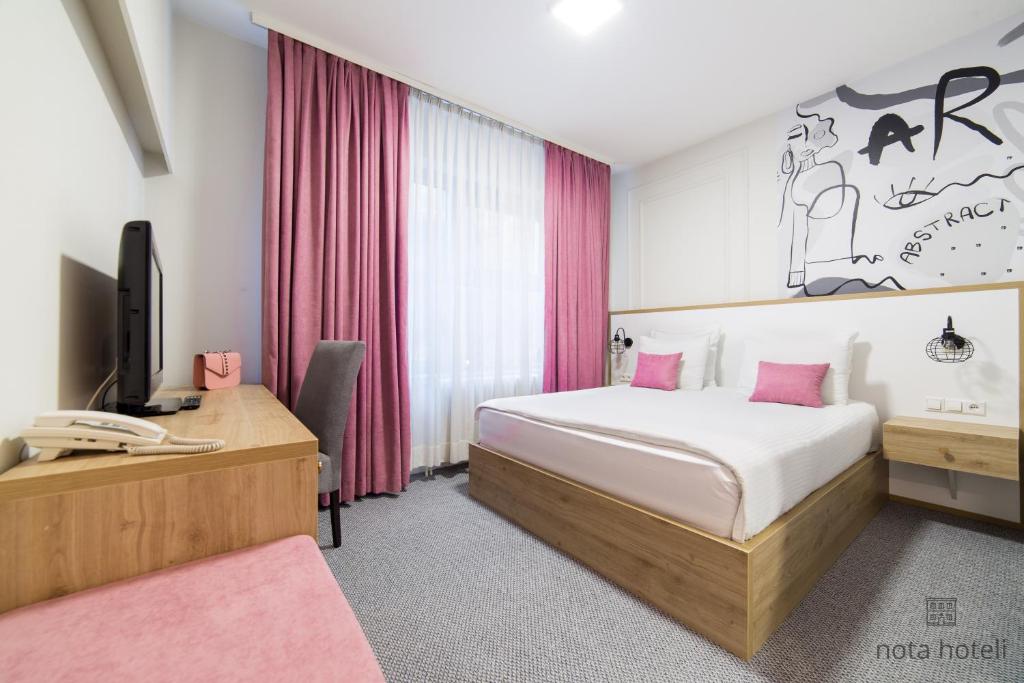 Krevet ili kreveti u jedinici u okviru objekta Hotel Sahat