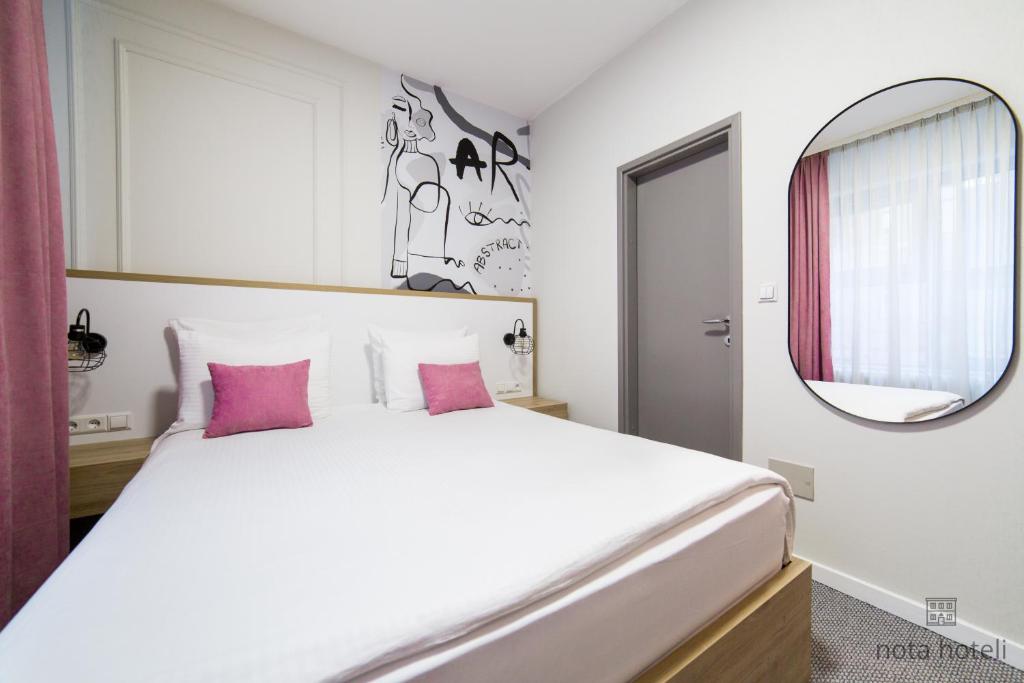 Krevet ili kreveti u jedinici u okviru objekta Hotel Sahat