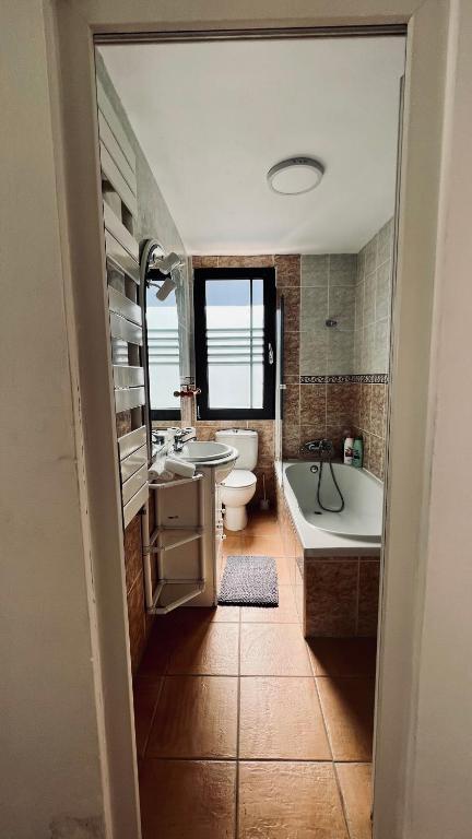 Koupelna v ubytování Ocean Suites