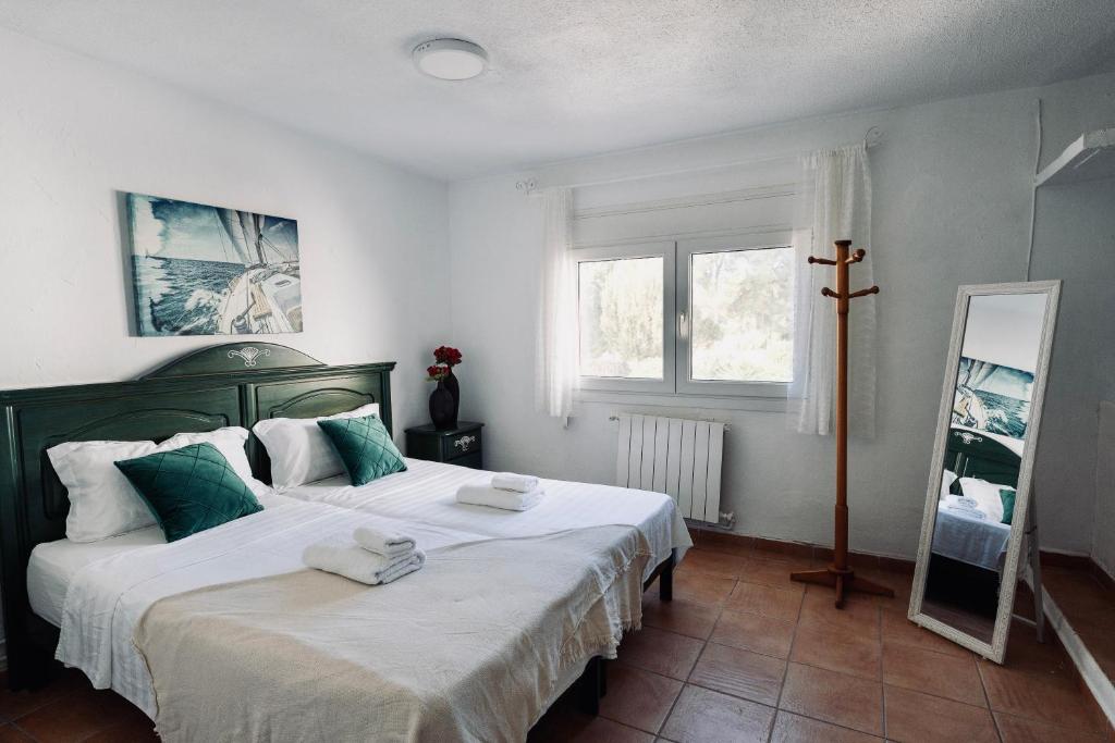 Postel nebo postele na pokoji v ubytování Ocean Suites