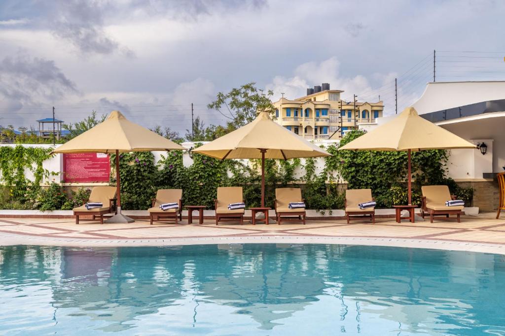 Bazén v ubytování PrideInn Hotel Diani nebo v jeho okolí